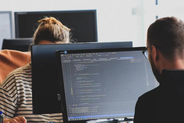 People working at screens