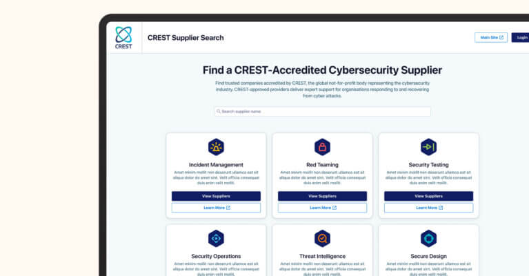 Laptop displaying a CREST supplier search webpage, with options for finding accredited cybersecurity suppliers through categories like incident management and security testing.