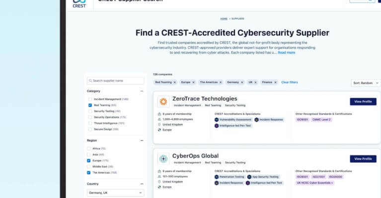 A laptop screen displaying the CREST Supplier Search webpage, showing a list of CREST-accredited cybersecurity suppliers with options to refine the search.
