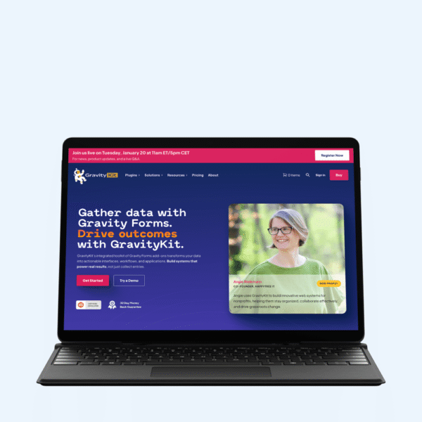 A laptop displays the GravityKit website homepage, highlighting a data collection service with Gravity Forms.
