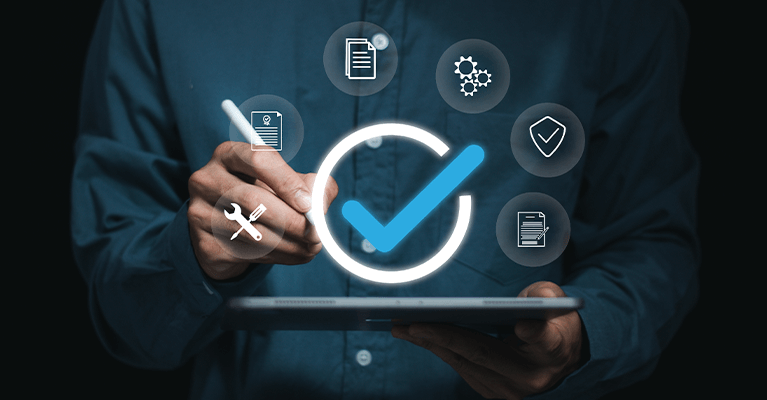 Person using a stylus on a tablet displaying a large check mark icon surrounded by service-related symbols.