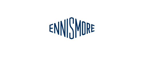 The Ennismore logo displayed in dark navy blue text on a white background. The wordmark features the brand name in bold, capitalised lettering with a distinctive diamond-shaped border framing the text.