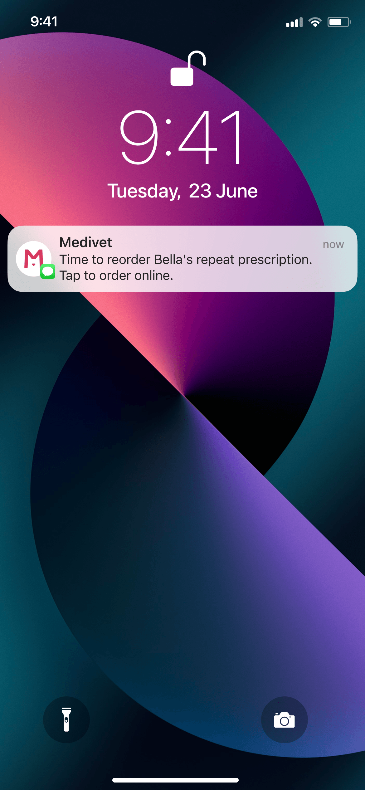iPhone lock screen showing 9:41, Tuesday 23 June, with a Medivet push notification: "Time to reorder Bella's repeat prescription. Tap to order online." Purple and pink abstract wallpaper behind, flashlight and camera shortcuts at the bottom.